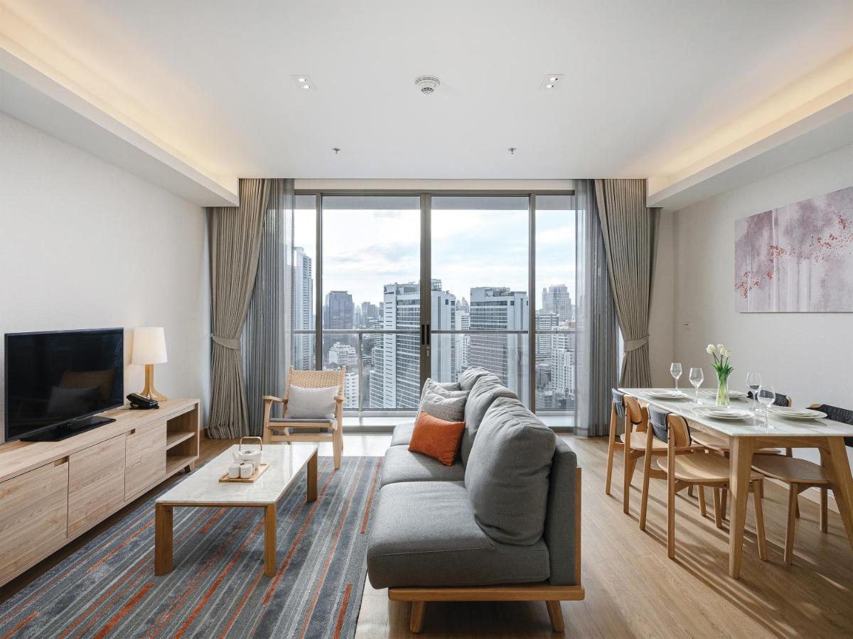 Oakwood Suites Bangkok Banguecoque Exterior foto Living room