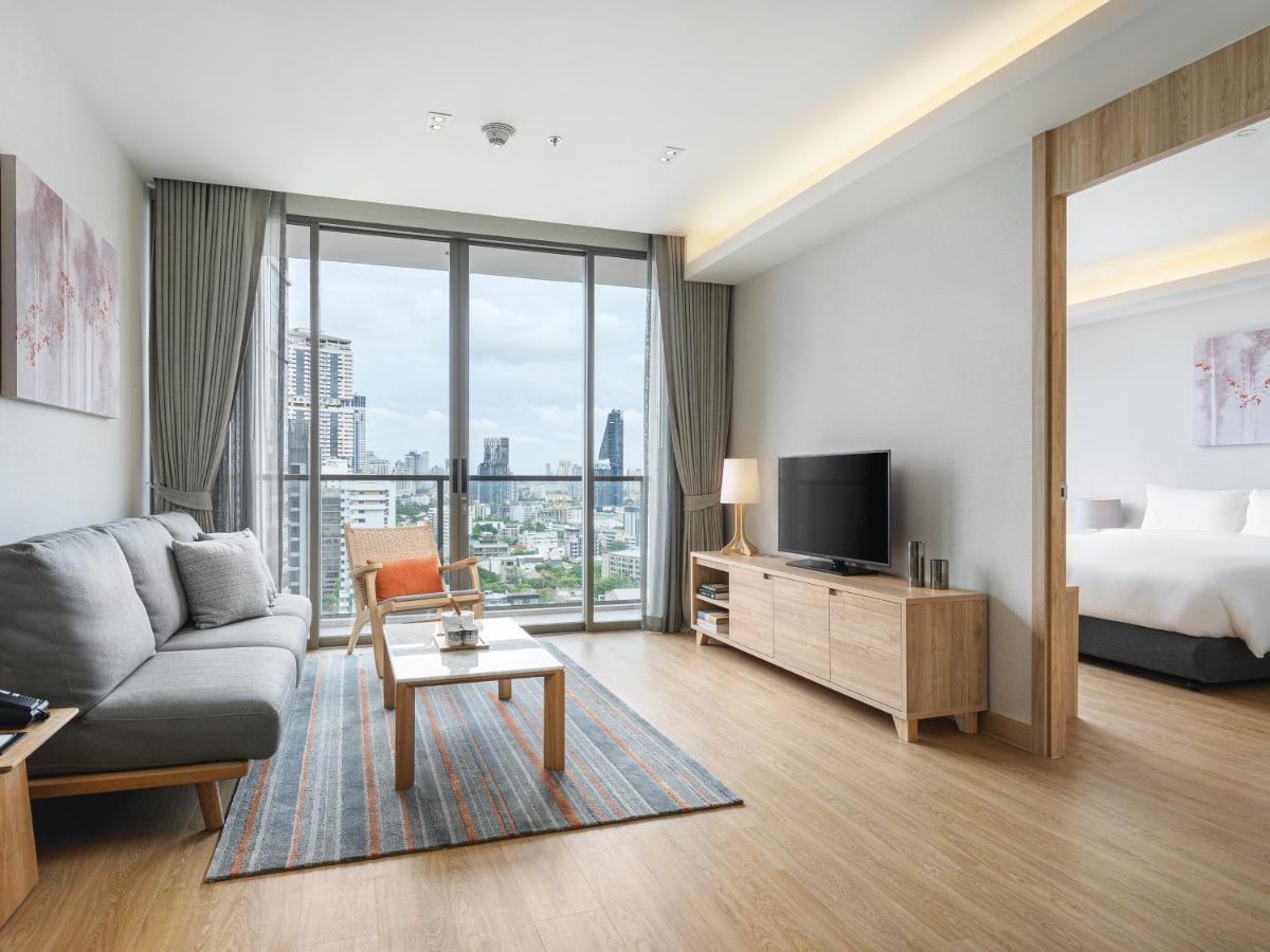 Oakwood Suites Bangkok Banguecoque Exterior foto Living room
