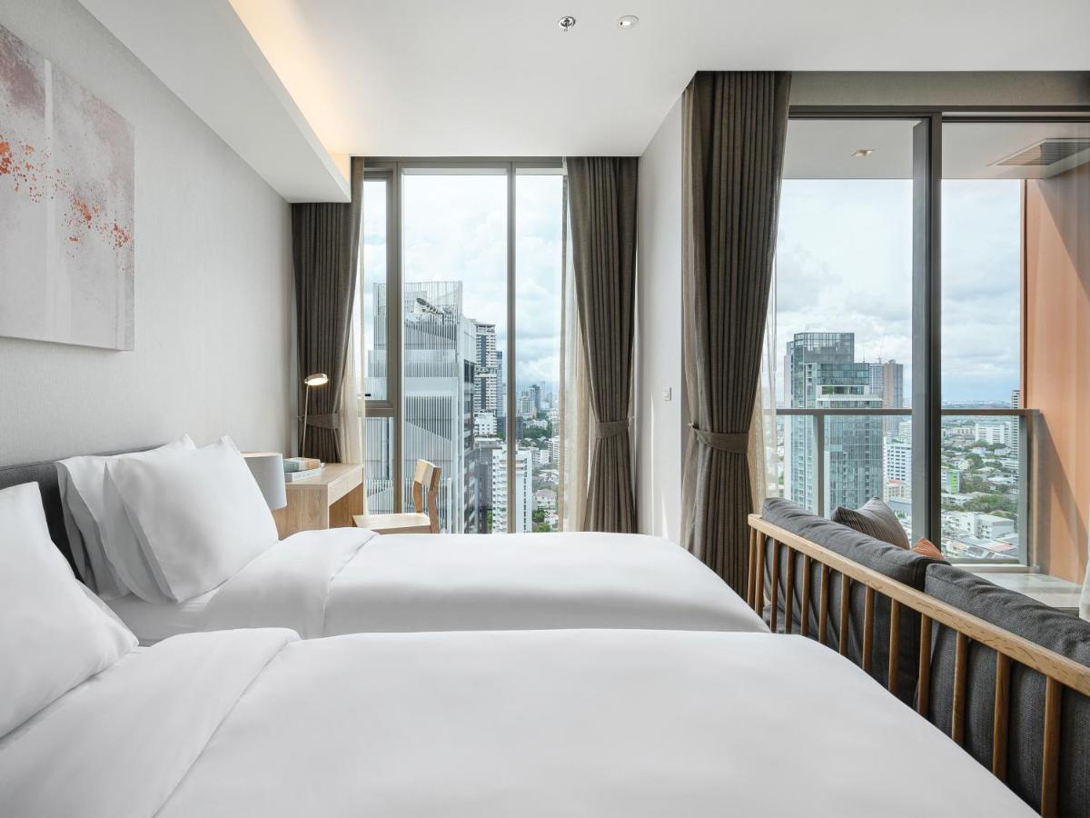 Oakwood Suites Bangkok Banguecoque Exterior foto Deluxe Room